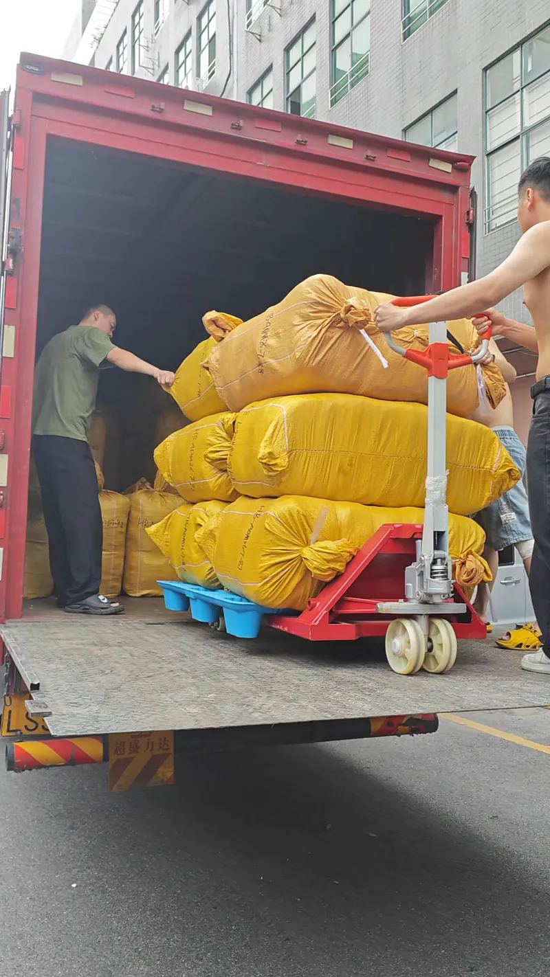 Packed goods being loaded for dispatch